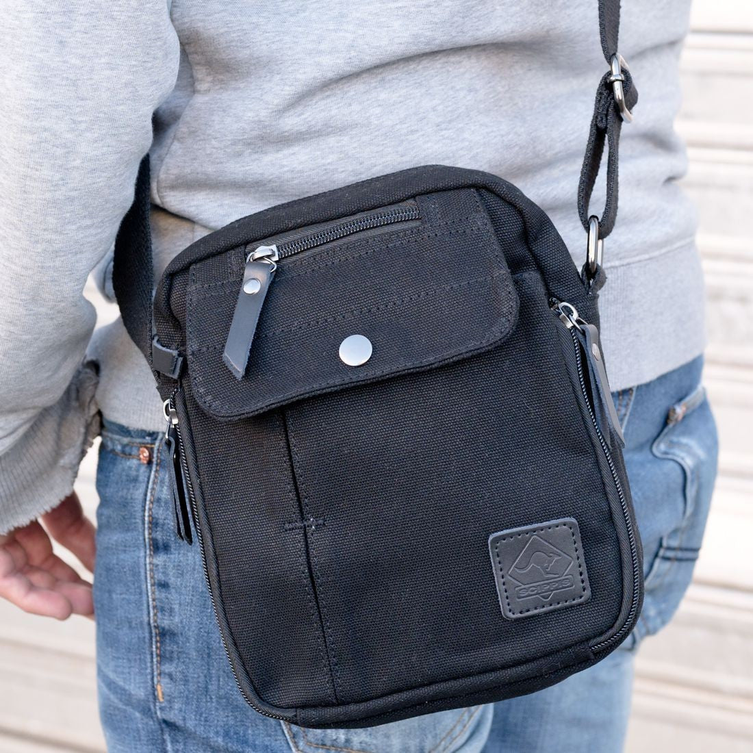 scippis port arthur tas – robuuste canvas schoudertas met lederen accenten