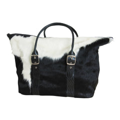 scippis reistas – travel bag cow – lederen weekendtas met koeienhuid – uniek & stijlvol voor reizen