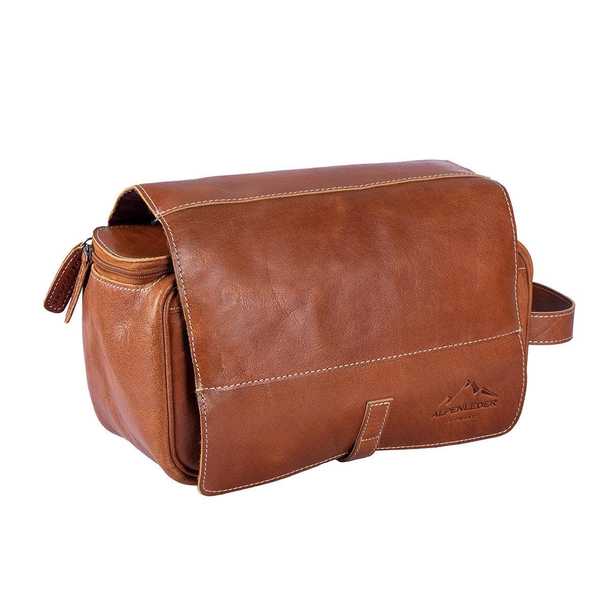 Binnenzijde van de leren toilettas met ritsvakken en ophanghaak